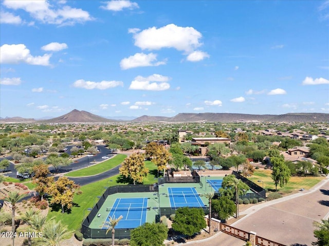 birds eye view of property featuring a mountain view