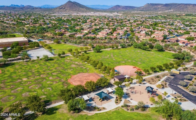 birds eye view of property featuring a mountain view