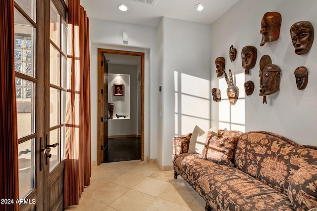 living room featuring light tile patterned flooring