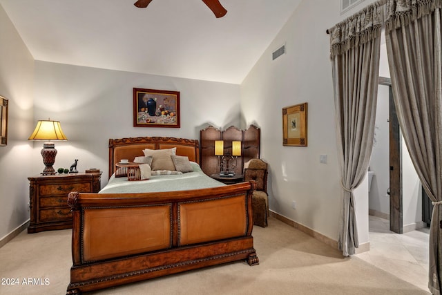 carpeted bedroom with ceiling fan and lofted ceiling