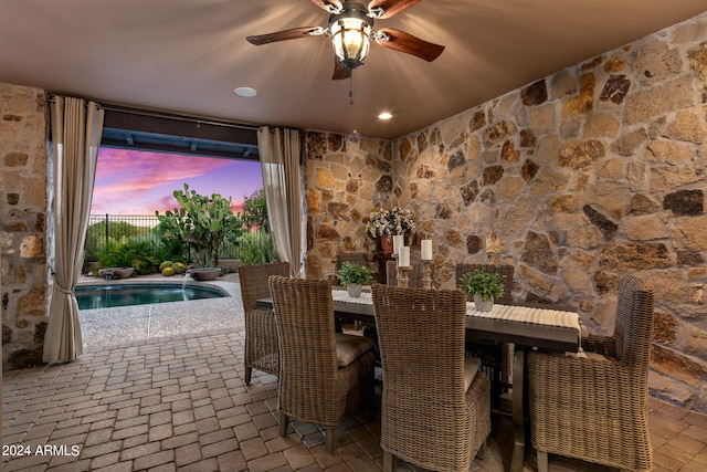 dining space with ceiling fan