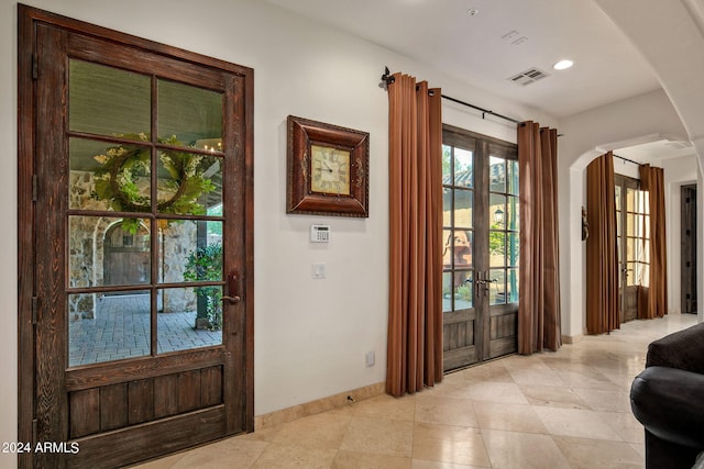 foyer featuring french doors