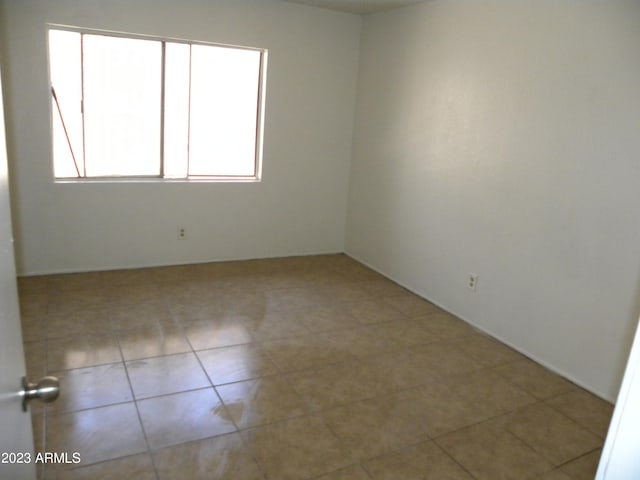 view of tiled empty room