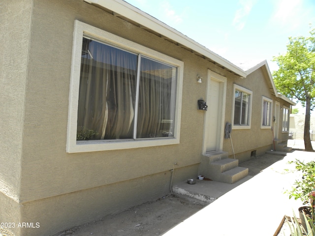 view of home's exterior with a patio area