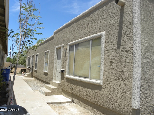 view of home's exterior featuring a patio area