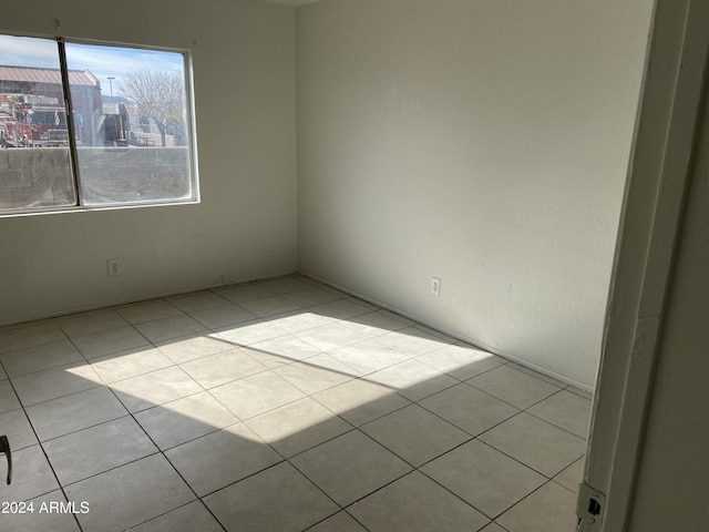 view of tiled spare room