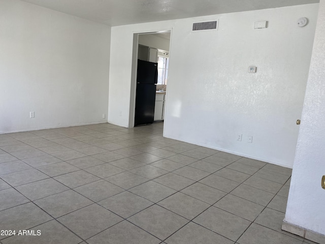 view of tiled spare room