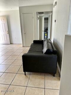 living room featuring light tile patterned floors