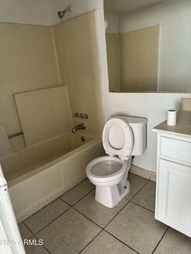 full bathroom with shower / bathtub combination, tile patterned floors, toilet, and vanity