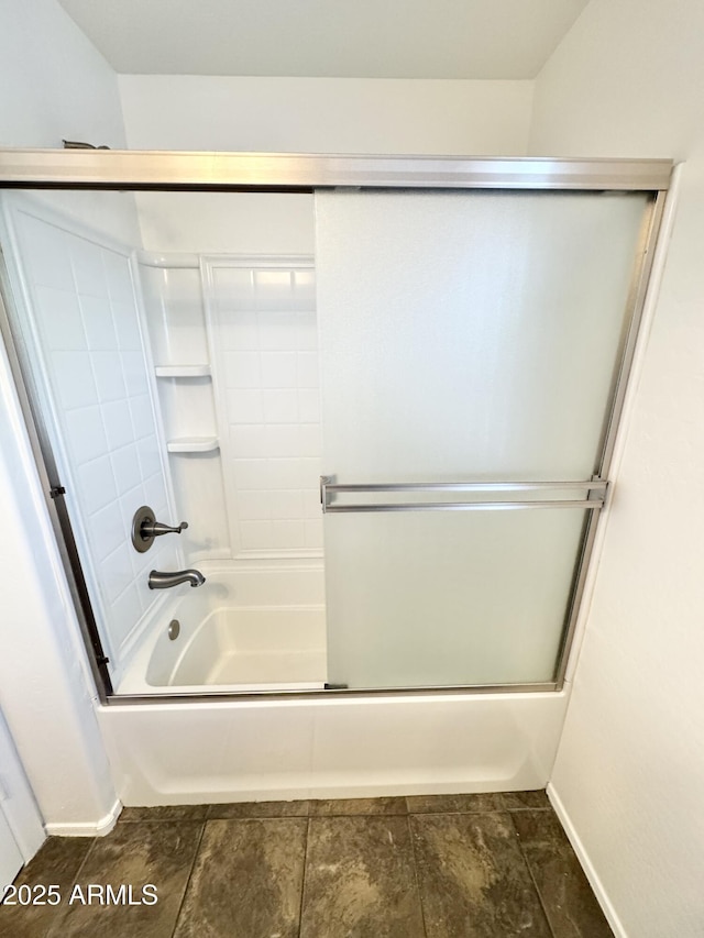 2539 N 148th Dr, Goodyear, AZ 85395 - full bathroom with combined bath / shower with glass door and baseboards
