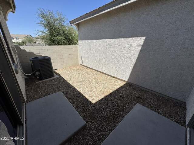 2539 N 148th Dr, Goodyear, AZ 85395 - view of yard featuring central air condition unit and a patio area