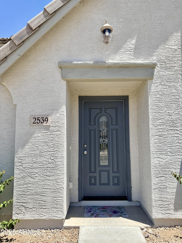 2539 N 148th Dr, Goodyear, AZ 85395 - doorway to property featuring stucco siding
