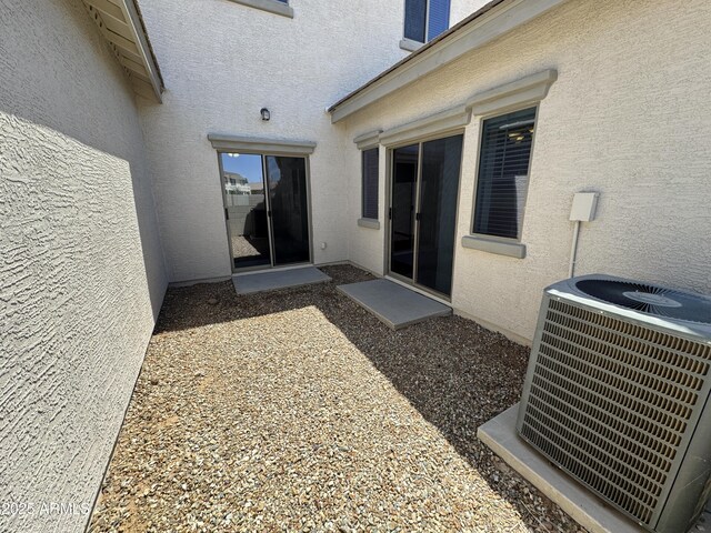 2539 N 148th Dr, Goodyear, AZ 85395 - entrance to property featuring stucco siding and central AC unit
