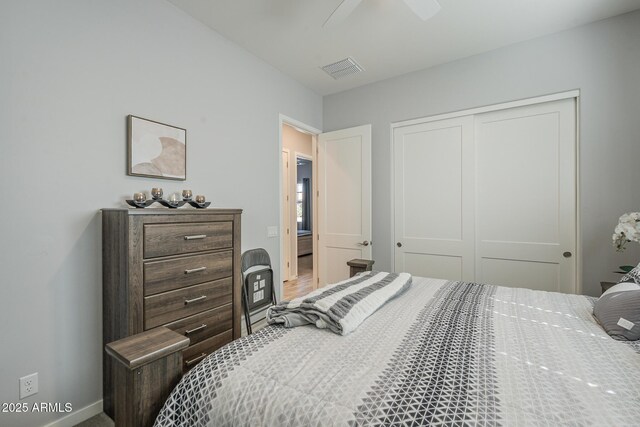 17253 W Echo Ln, Waddell, AZ 85355 - bedroom with a closet, ceiling fan, and baseboards