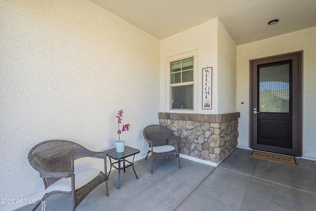 17253 W Echo Ln, Waddell, AZ 85355 - entrance to property with stucco siding and stone siding