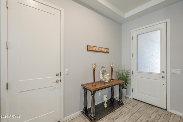 17253 W Echo Ln, Waddell, AZ 85355 - entryway with light wood finished floors and baseboards