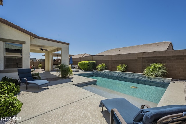 17253 W Echo Ln, Waddell, AZ 85355 - view of pool featuring ceiling fan, a patio, and a fenced backyard