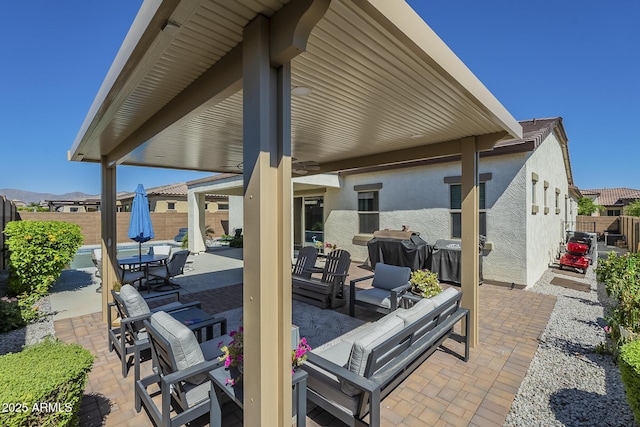 17253 W Echo Ln, Waddell, AZ 85355 - view of patio / terrace with a fenced backyard and a grill