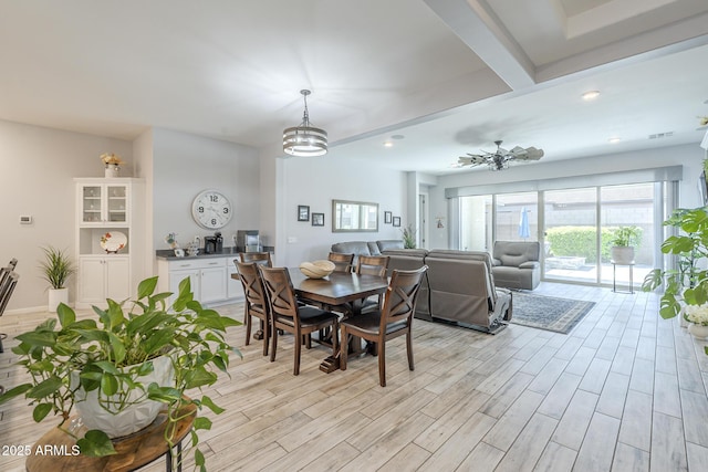 17253 W Echo Ln, Waddell, AZ 85355 - dining room with light wood-style floors, a chandelier, and recessed lighting