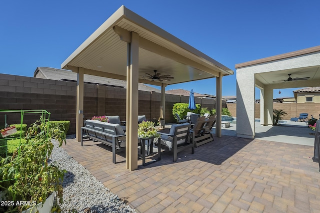 17253 W Echo Ln, Waddell, AZ 85355 - view of patio featuring a ceiling fan, a fenced backyard, and an outdoor hangout area