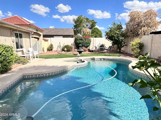 view of pool with a patio