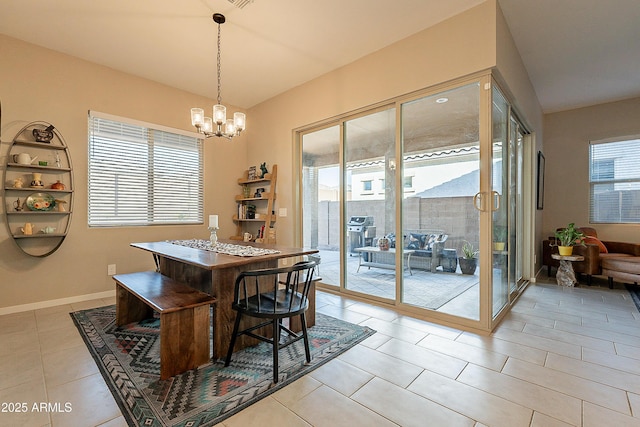 tiled dining space featuring vaulted ceiling and a notable chandelier