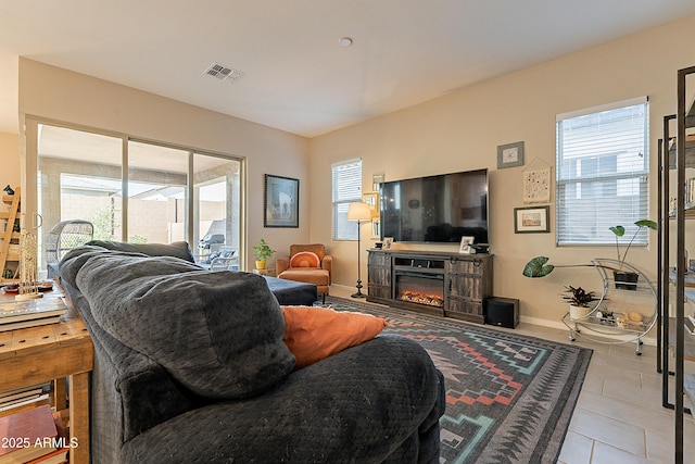 living room featuring light tile patterned floors