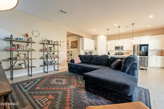 living room featuring light tile patterned floors