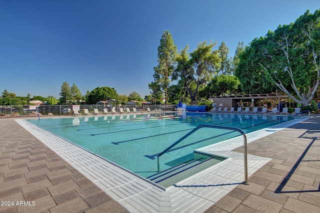 view of pool featuring a patio area