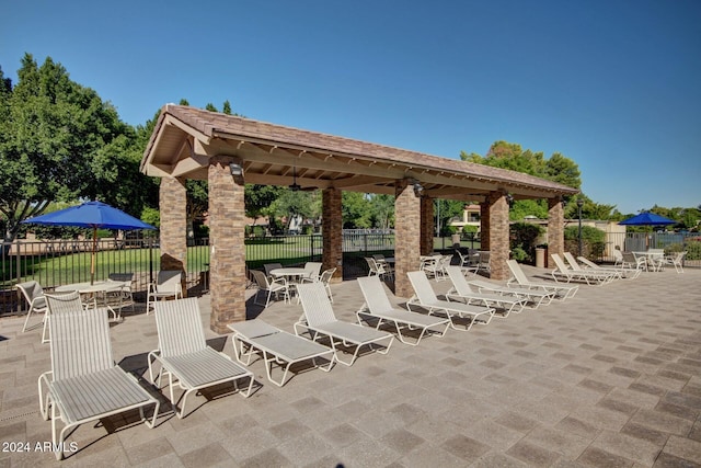 view of patio with ceiling fan