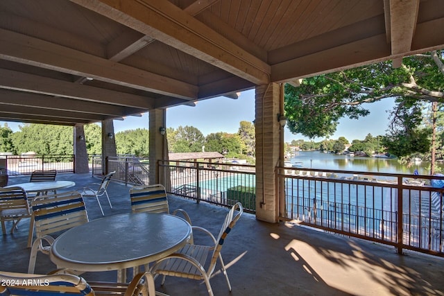 view of patio / terrace with a water view