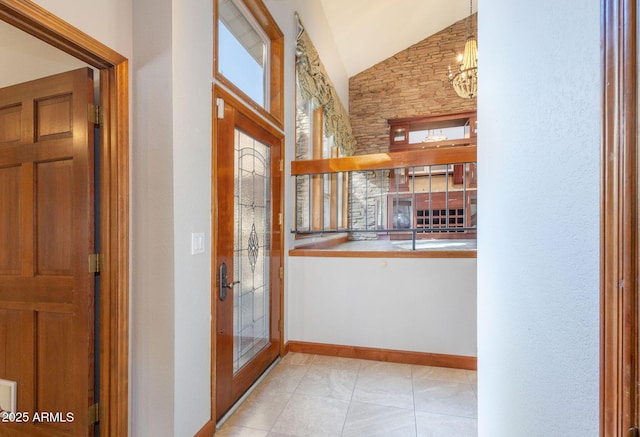 interior space with lofted ceiling and a chandelier