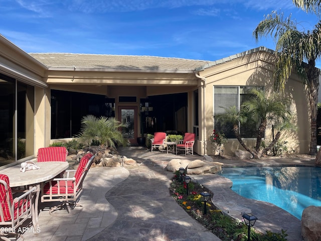 view of swimming pool featuring a patio area