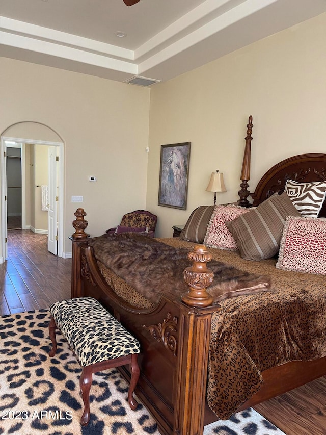 bedroom featuring dark wood-type flooring