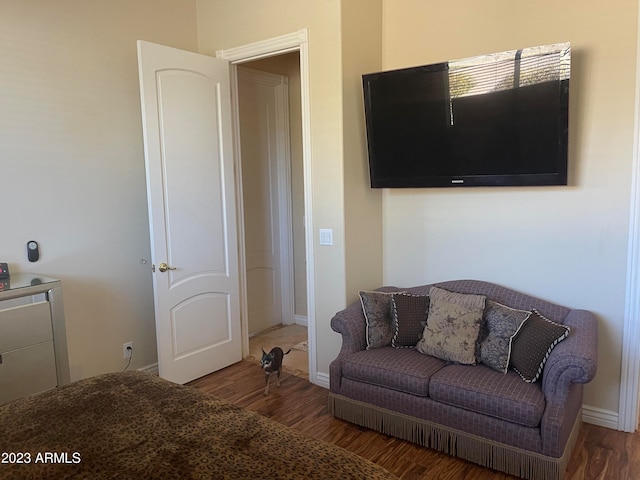 living area with dark hardwood / wood-style floors