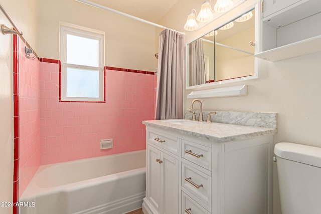 full bathroom with vanity, toilet, and shower / tub combo