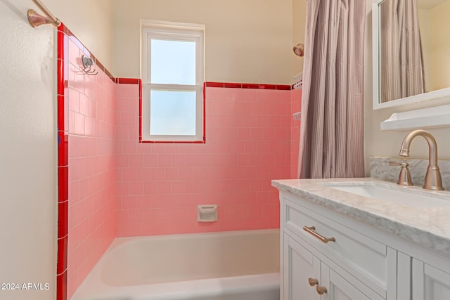 bathroom with vanity and shower / tub combo