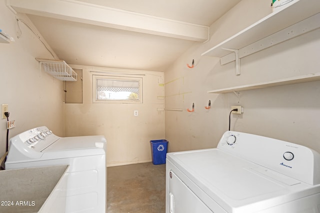 washroom with independent washer and dryer