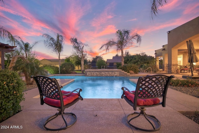 outdoor pool featuring a patio