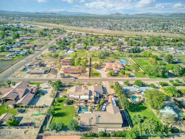 birds eye view of property featuring a residential view and a mountain view