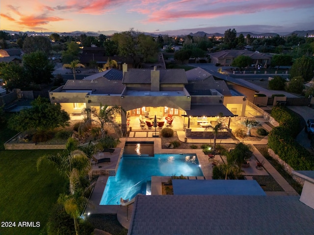 aerial view at dusk with a residential view