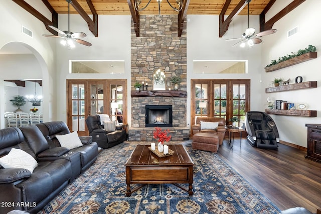 living room with wood ceiling, ceiling fan, and visible vents