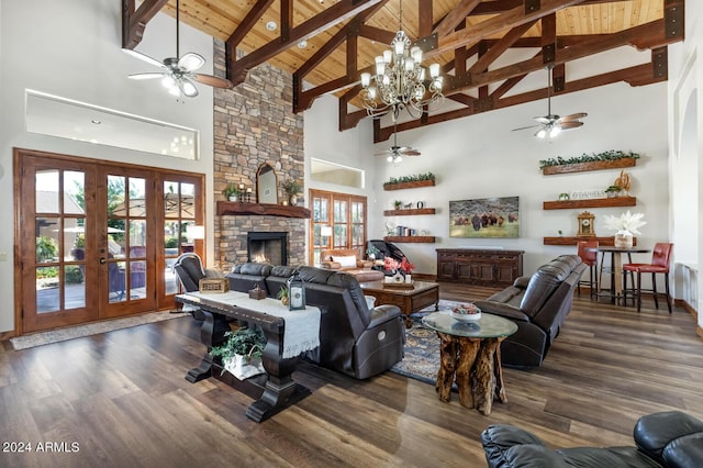 living area with high vaulted ceiling, wooden ceiling, french doors, and ceiling fan with notable chandelier