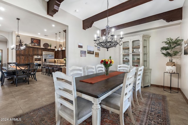 dining room featuring an inviting chandelier, beam ceiling, arched walkways, recessed lighting, and baseboards