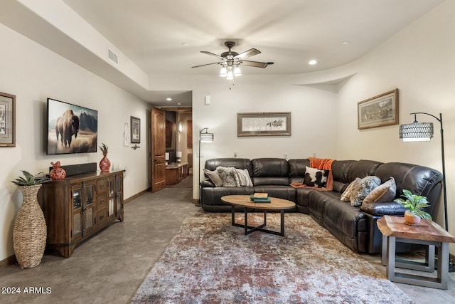living area with visible vents, a ceiling fan, baseboards, and recessed lighting