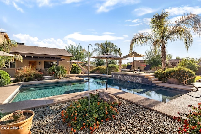 outdoor pool featuring a patio