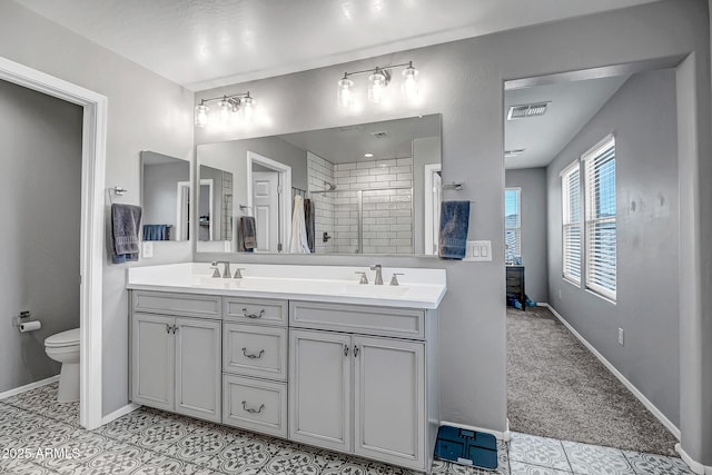 33275 N 132nd Ave, Peoria, AZ 85383 - full bath featuring a sink, double vanity, toilet, visible vents, and tiled shower