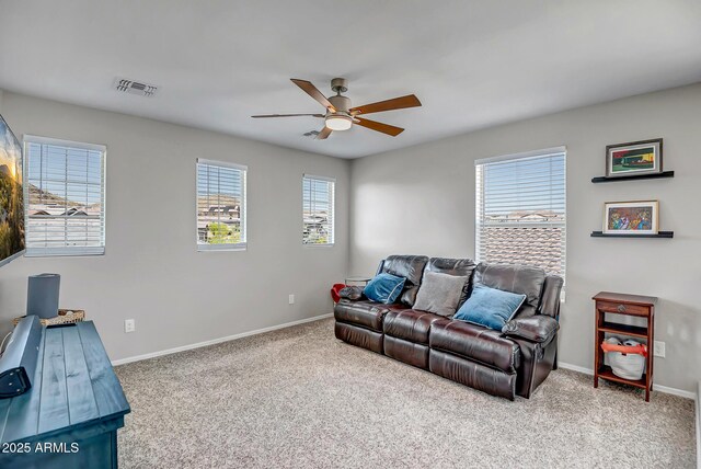 33275 N 132nd Ave, Peoria, AZ 85383 - carpeted living room with ceiling fan, baseboards, and visible vents