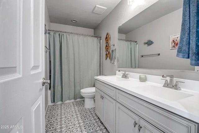 33275 N 132nd Ave, Peoria, AZ 85383 - bathroom featuring double vanity, visible vents, toilet, and a sink