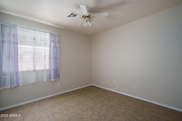 10618 W Pima St, Tolleson, AZ 85353 - empty room featuring a ceiling fan and baseboards